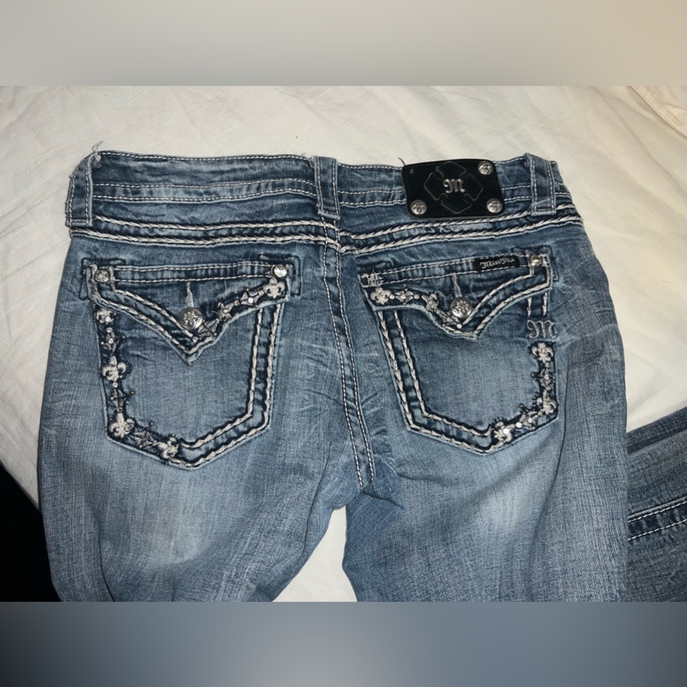 Miss me ripped from bottom a bit